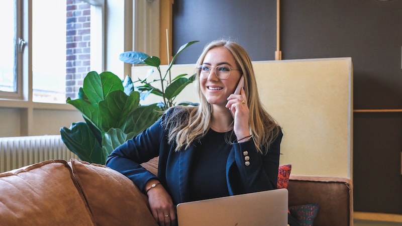 The sales manager is on the phone with the customer