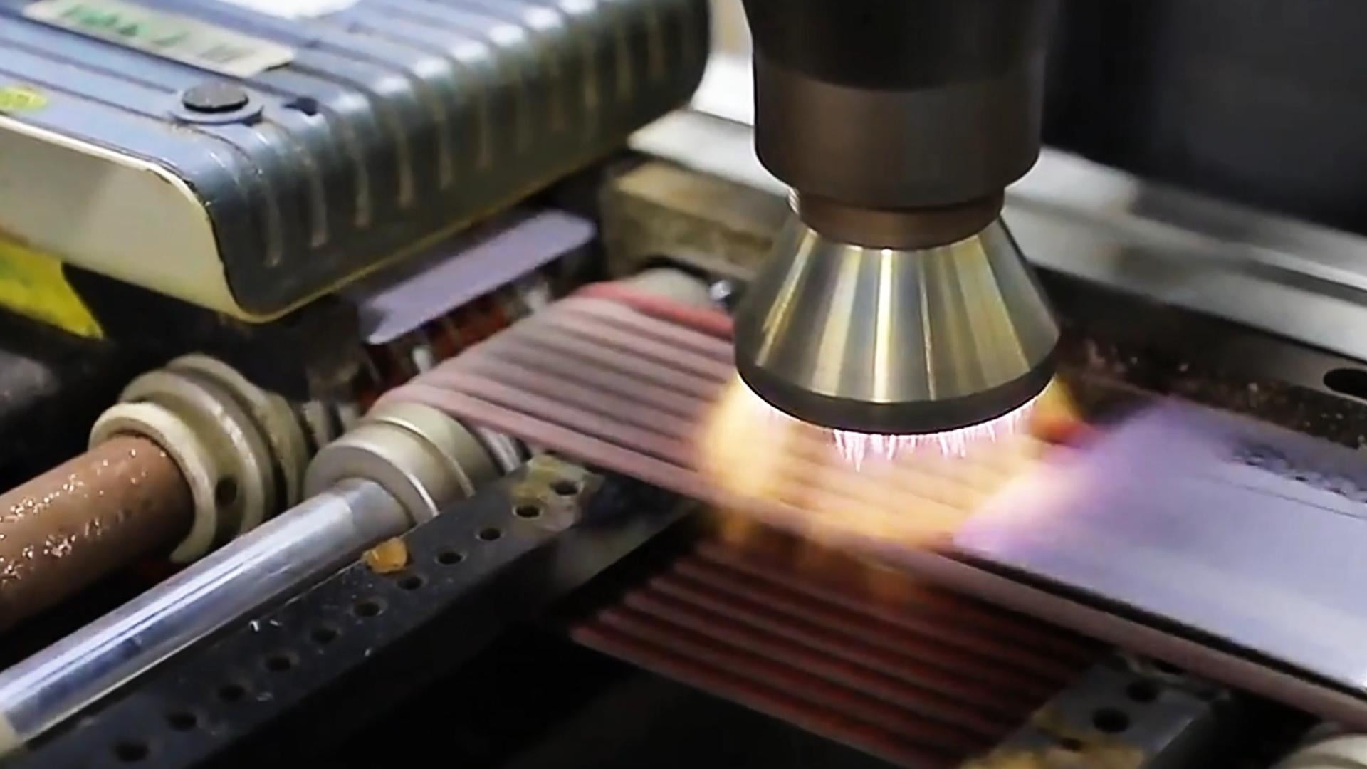 Laser engraving unit marking personalization data into a polycarbonate ID card