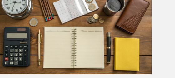 Procurement analyst workspace reviewing security packaging cost factors