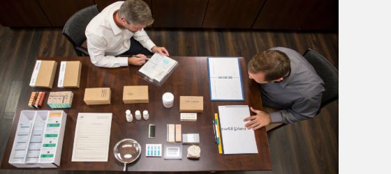 Procurement review matching security packaging to risk profile by industry